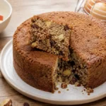 Bolo de frutas sem leite, sem açúcar adicionado e sem glúten Bolo de frutas sem leite e sem glúten com maçã, banana, uvas-passas e castanhas