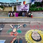 Rua das Penhas leva arte contra a violência às ruas de Porto Velho Rua das Penhas reúne intervenção artística, participantes e pinturas contra a violência às mulheres em Porto Velho.